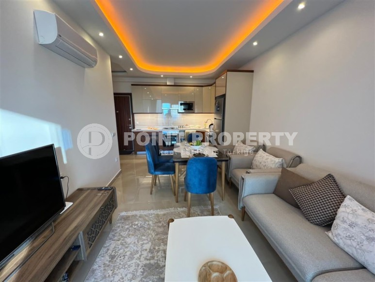 Современная квартира 70 м² с видом на море в районе Махмутлар-id-8908-фото-4