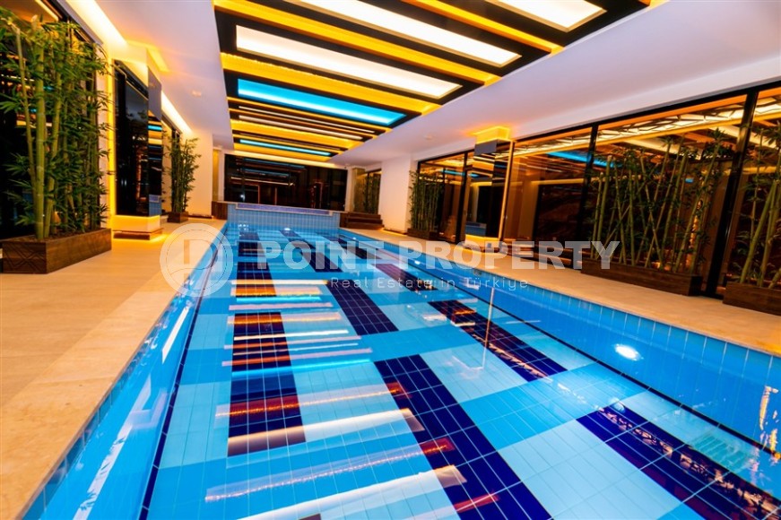 Современная квартира 70 м² с видом на море в районе Махмутлар-id-8908-фото-12