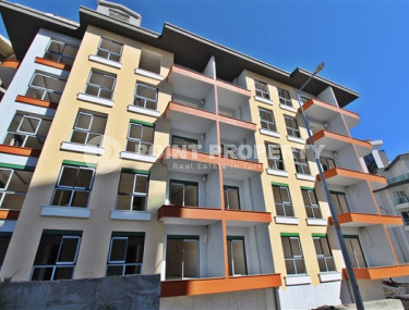 New one bedroom apartment, 55m². in a complex under construction in Mahmutlar area, Alanya-id-1694-photo-2