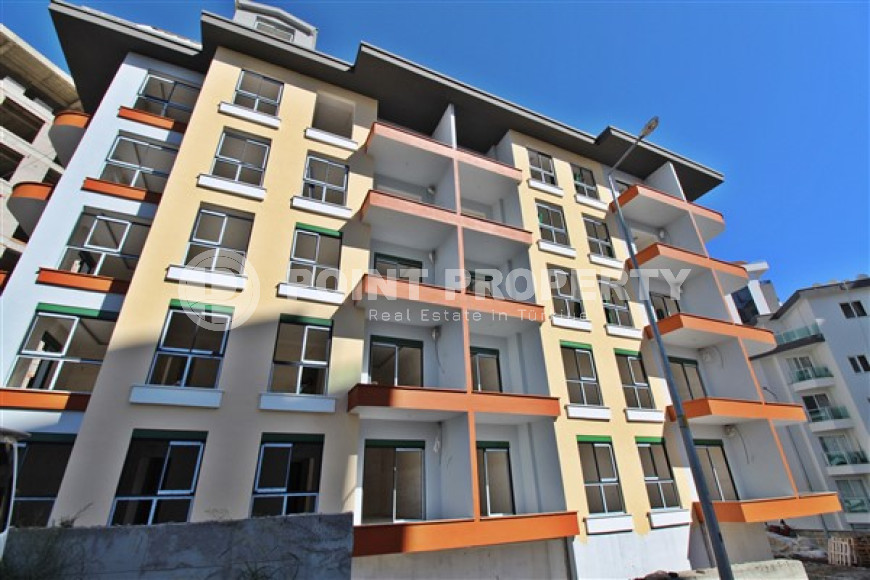 New one bedroom apartment, 55m². in a complex under construction in Mahmutlar area, Alanya-id-1694-photo-2