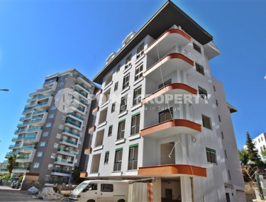 New one bedroom apartment, 55m². in a complex under construction in Mahmutlar area, Alanya-id-1694-photo-3