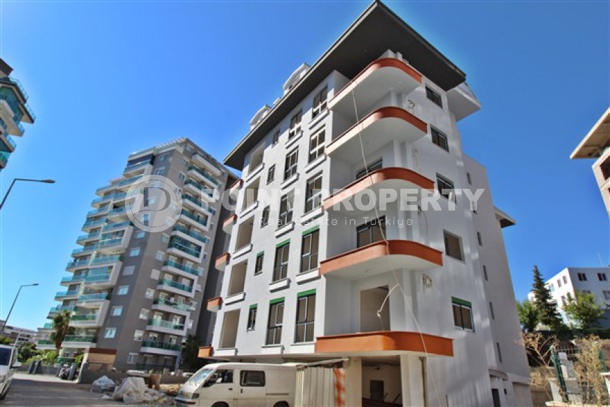 New one bedroom apartment, 55m². in a complex under construction in Mahmutlar area, Alanya-id-1694-photo-3