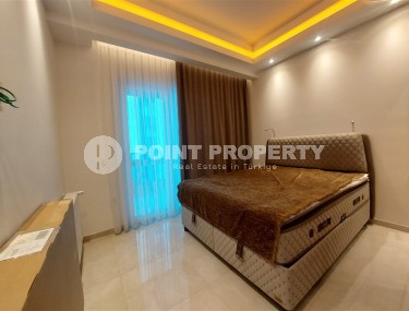 Стильная квартира 56 м² в престижном комплексе в центре Махмутлара-id-8909-фото-5