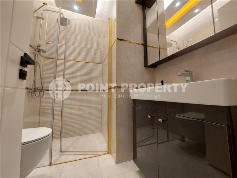 Стильная квартира 56 м² в престижном комплексе в центре Махмутлара-id-8909-фото-6