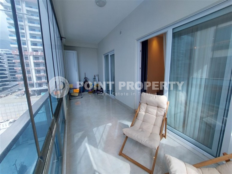 Стильная квартира 56 м² в престижном комплексе в центре Махмутлара-id-8909-фото-8