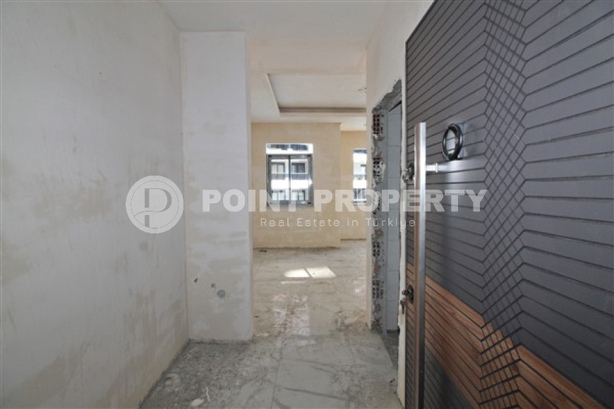 New one bedroom apartment, 55m². in a complex under construction in Mahmutlar area, Alanya-id-1694-photo-4
