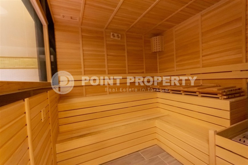 Стильная квартира 56 м² в престижном комплексе в центре Махмутлара-id-8909-фото-16