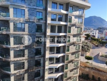Apartments in a premium class residential complex under construction, in the center of a picturesque, environmentally friendly area of Alanya - Tosmur-id-7283-photo-3