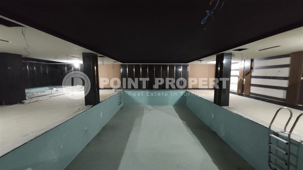 Квартиры в строящемся жилом комплексе премиум класса, в центре живописного, экологически чистого района Аланьи - Тосмур-id-7283-фото-13