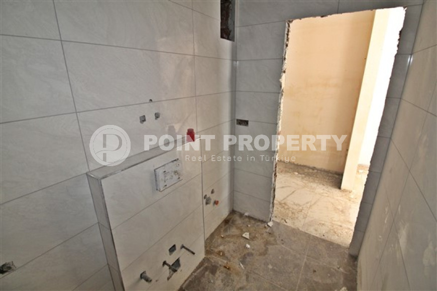 New one bedroom apartment, 55m². in a complex under construction in Mahmutlar area, Alanya-id-1694-photo-7