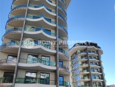 New two-room apartment 55 m2 in a residence under construction consisting of three buildings, Tosmur district-id-3974-photo-2