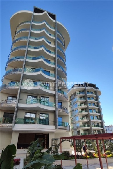 New two-room apartment 55 m2 in a residence under construction consisting of three buildings, Tosmur district-id-3974-photo-2