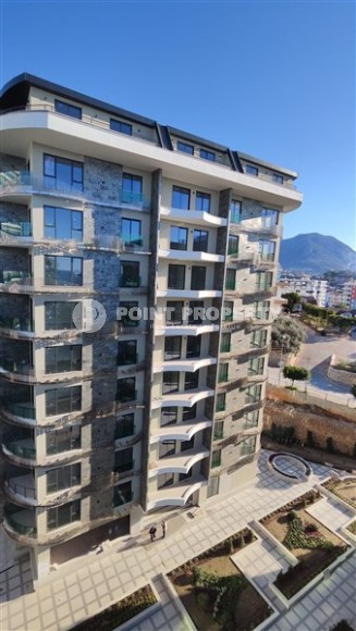 New two-room apartment 55 m2 in a residence under construction consisting of three buildings, Tosmur district-id-3974-photo-3