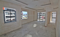New one bedroom apartment, 55m². in a complex under construction in Mahmutlar area, Alanya-id-1694-photo-8