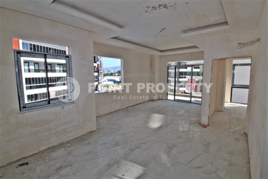 New one bedroom apartment, 55m². in a complex under construction in Mahmutlar area, Alanya-id-1694-photo-8