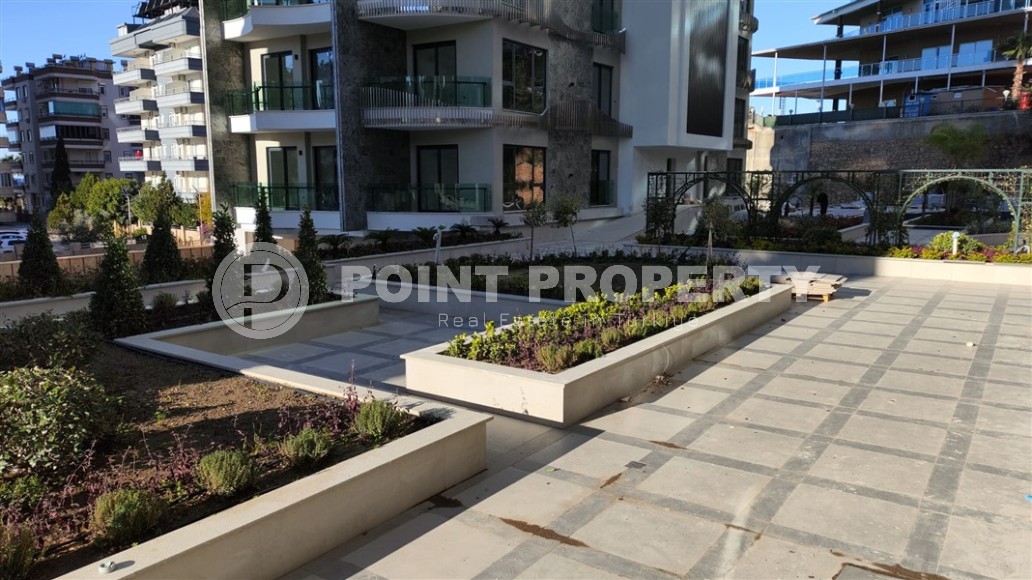 New two-room apartment 55 m2 in a residence under construction consisting of three buildings, Tosmur district-id-3974-photo-9