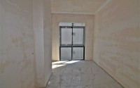 New one bedroom apartment, 55m². in a complex under construction in Mahmutlar area, Alanya-id-1694-photo-12
