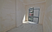 New one bedroom apartment, 55m². in a complex under construction in Mahmutlar area, Alanya-id-1694-photo-13
