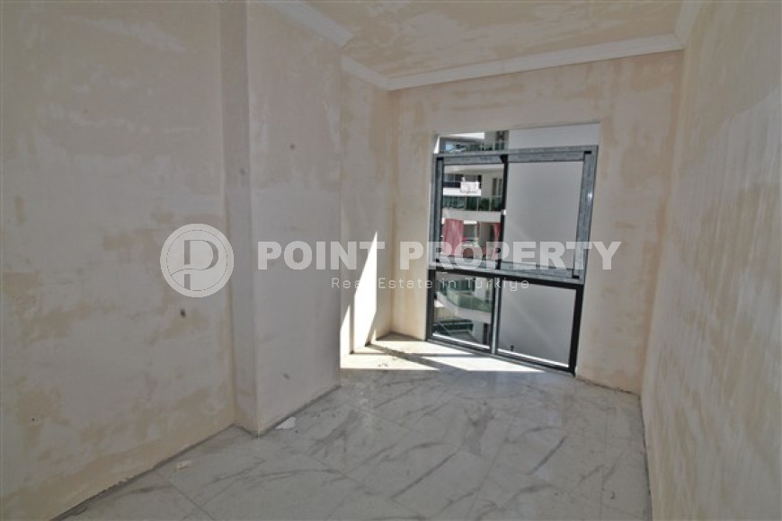 New one bedroom apartment, 55m². in a complex under construction in Mahmutlar area, Alanya-id-1694-photo-13