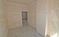 New one bedroom apartment, 55m². in a complex under construction in Mahmutlar area, Alanya-id-1694-photo-14