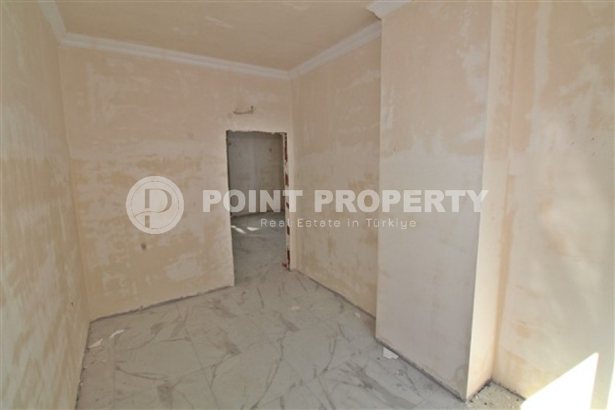 New one bedroom apartment, 55m². in a complex under construction in Mahmutlar area, Alanya-id-1694-photo-14