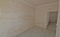 New one bedroom apartment, 55m². in a complex under construction in Mahmutlar area, Alanya-id-1694-photo-15