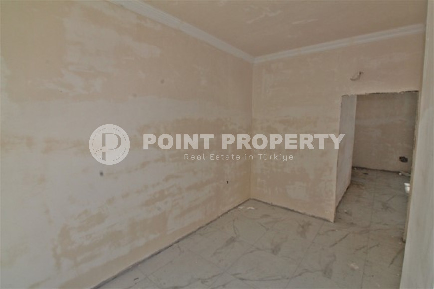 New one bedroom apartment, 55m². in a complex under construction in Mahmutlar area, Alanya-id-1694-photo-15