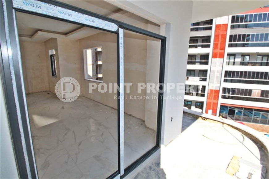 New one bedroom apartment, 55m². in a complex under construction in Mahmutlar area, Alanya-id-1694-photo-17