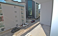 New one bedroom apartment, 55m². in a complex under construction in Mahmutlar area, Alanya-id-1694-photo-18
