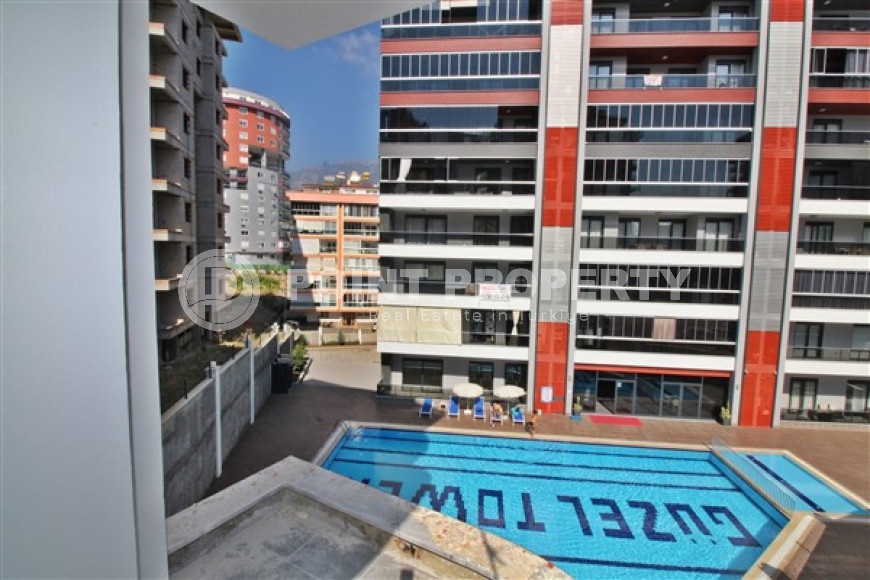 New one bedroom apartment, 55m². in a complex under construction in Mahmutlar area, Alanya-id-1694-photo-19