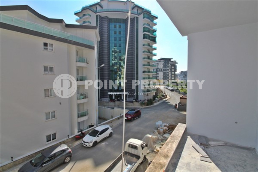 New one bedroom apartment, 55m². in a complex under construction in Mahmutlar area, Alanya-id-1694-photo-21