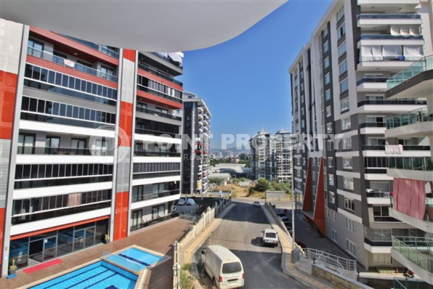New one bedroom apartment, 55m². in a complex under construction in Mahmutlar area, Alanya-id-1694-photo-22