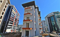 New one bedroom apartment, 55m². in a complex under construction in Mahmutlar area, Alanya-id-1694-photo-25