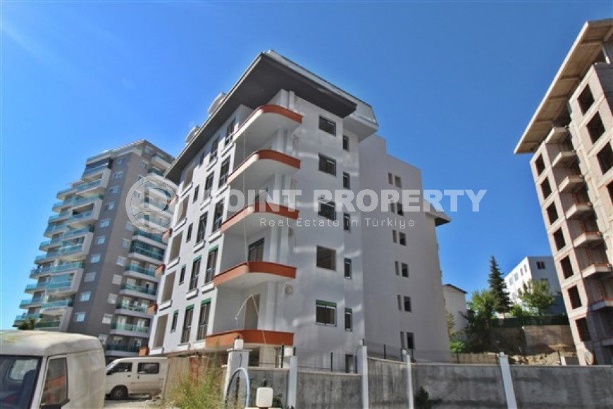New one bedroom apartment, 55m². in a complex under construction in Mahmutlar area, Alanya-id-1694-photo-26