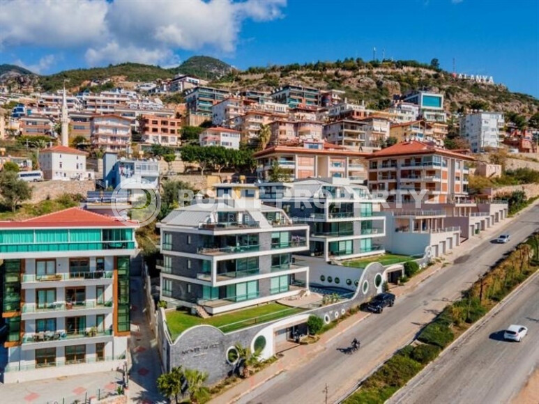 Stylish apartment 100 m² with sea view in the center of Alanya-id-8929-photo-1