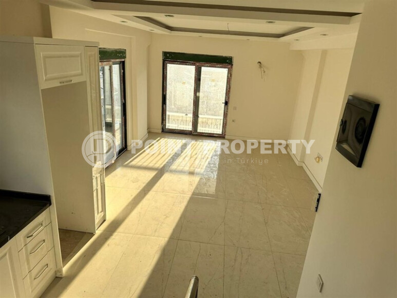 Современный дуплекс 125 м² в Махмутларе-id-8941-фото-2