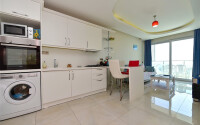A cozy apartment right on the seashore with a view of the sea surface-id-8954-photo-2