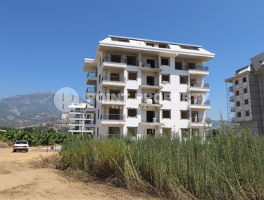 Двухкомнатная квартира, 75м², в комплексе на окончательном этапе строительства у моря, в Каргыджаке, Алания-id-1700-фото-2