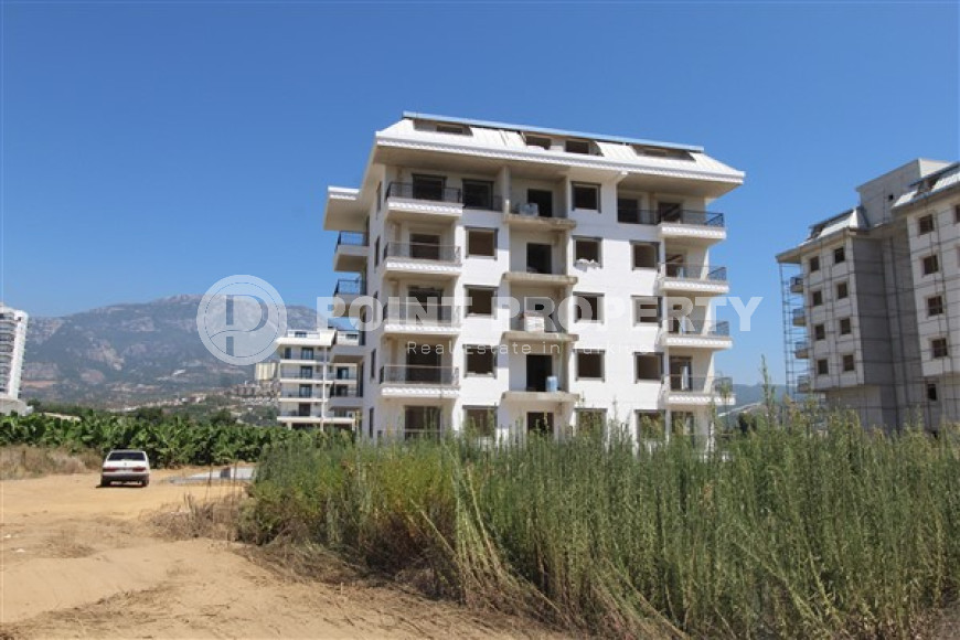 Двухкомнатная квартира, 75м², в комплексе на окончательном этапе строительства у моря, в Каргыджаке, Алания-id-1700-фото-2