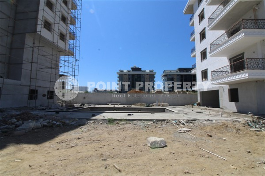 Двухкомнатная квартира, 75м², в комплексе на окончательном этапе строительства у моря, в Каргыджаке, Алания-id-1700-фото-3