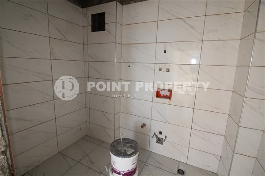 Двухкомнатная квартира, 75м², в комплексе на окончательном этапе строительства у моря, в Каргыджаке, Алания-id-1700-фото-7