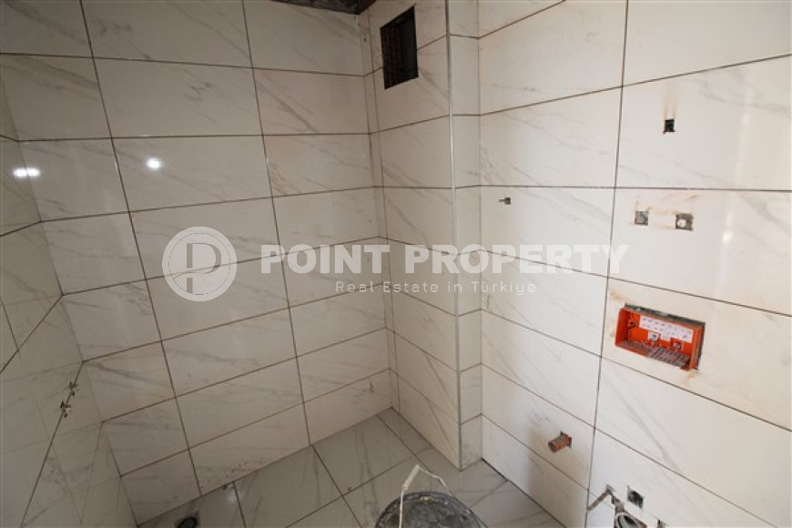 Двухкомнатная квартира, 75м², в комплексе на окончательном этапе строительства у моря, в Каргыджаке, Алания-id-1700-фото-9