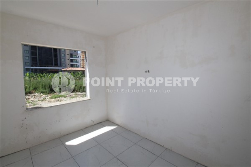 Двухкомнатная квартира, 75м², в комплексе на окончательном этапе строительства у моря, в Каргыджаке, Алания-id-1700-фото-11