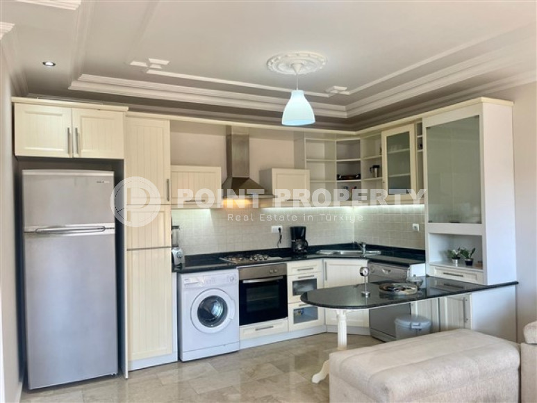 Меблированная квартира с одной спальней, 70м², в центре Алании в комплексе с инфраструктурой-id-1704-фото-2