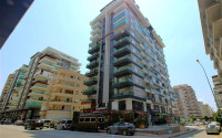 Furnished two bedroom apartment, 115m², on the main street of Mahmutlar, Alanya-id-1725-photo-1