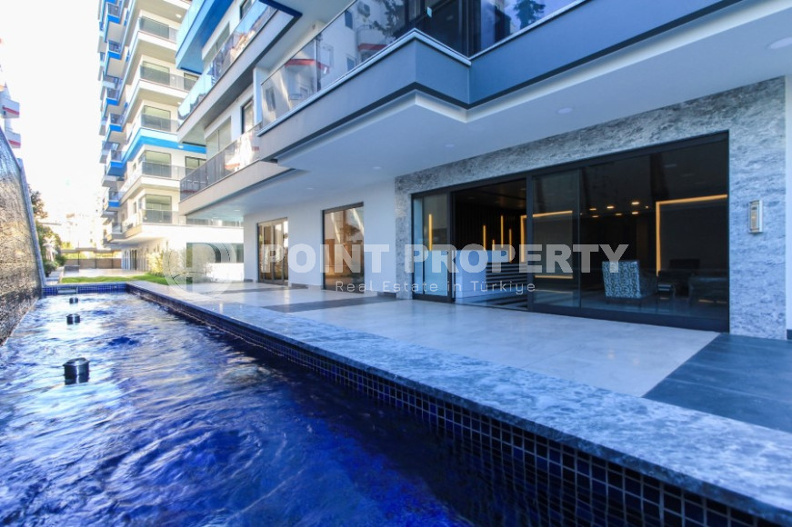 Уникальный комплекс премиум-класса на первой береговой линии в Махмутларе, личный подземный переход к собственному пляжу-id-1101-фото-3