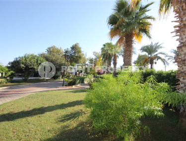 Трехкомнатная видовая квартира, 115м², с новой мебелью, в 50м от моря в районе Алании Демирташ-id-1732-фото-4