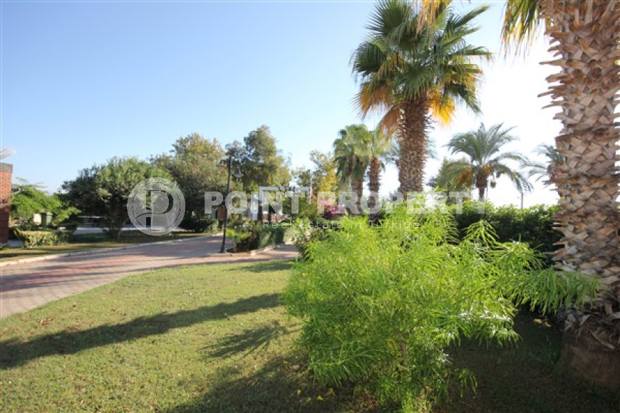 Трехкомнатная видовая квартира, 115м², с новой мебелью, в 50м от моря в районе Алании Демирташ-id-1732-фото-4