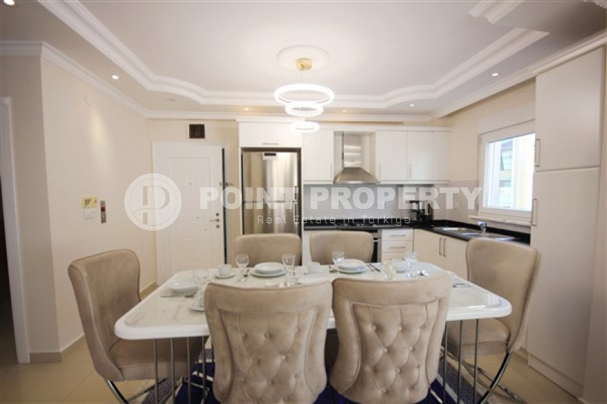 Трехкомнатная видовая квартира, 115м², с новой мебелью, в 50м от моря в районе Алании Демирташ-id-1732-фото-13