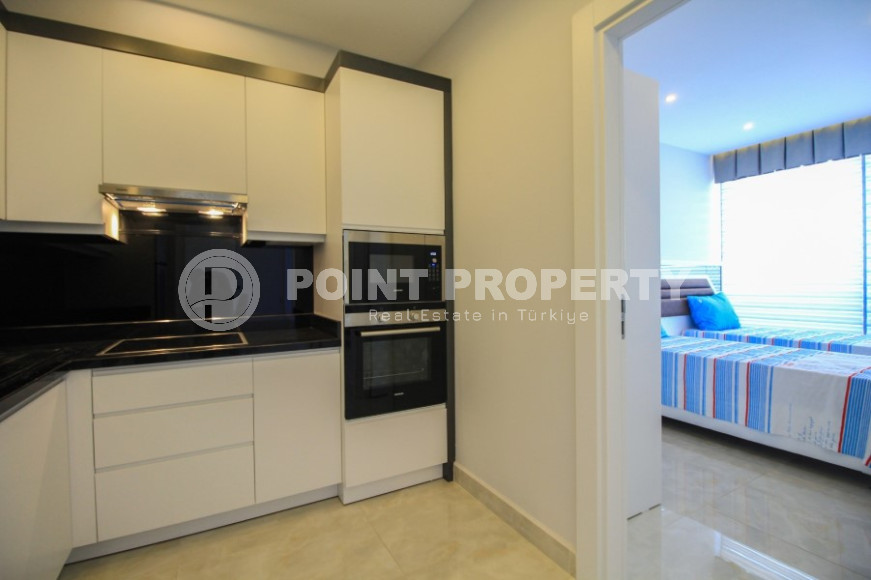 Уникальный комплекс премиум-класса на первой береговой линии в Махмутларе, личный подземный переход к собственному пляжу-id-1101-фото-19